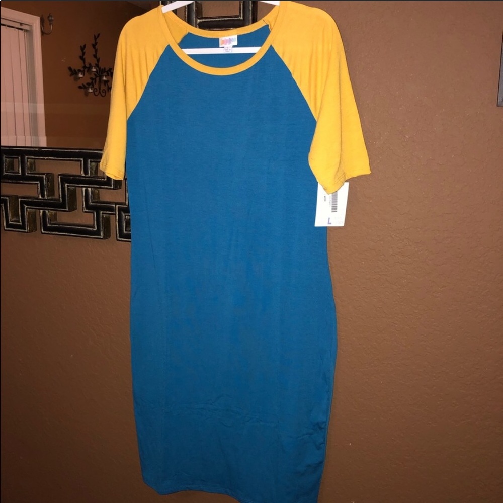 Lularoe Julia in blue and yellow. Cute and fun!